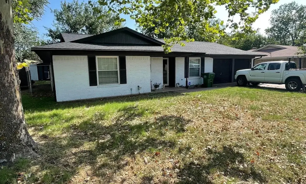 Professional roofing crew working on a residential roof in Lake Wisconsin